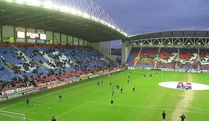 Biển hiệu cũ của sân vận động JJB, tên trước đây của sân nhà Wigan Athletic, nhắc nhớ một thời kỳ lịch sử